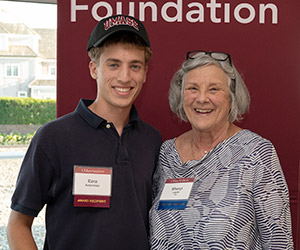 Scholarship Committee Chair Sheryl Lajoie '69 	congratulates 2026-27 scholarship recipient Ezra Ackerman '30.
