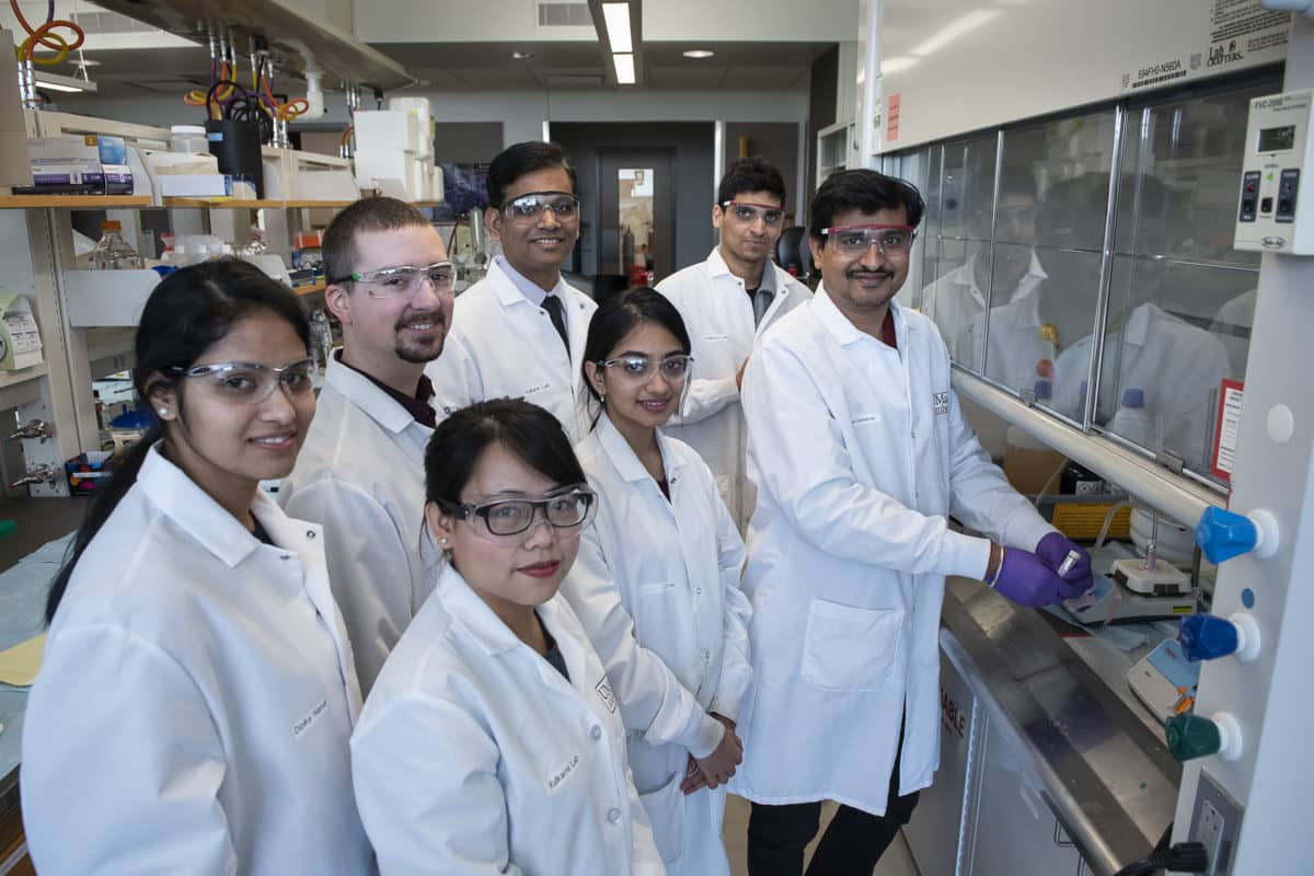 Associate Professor Kulkarni with his team