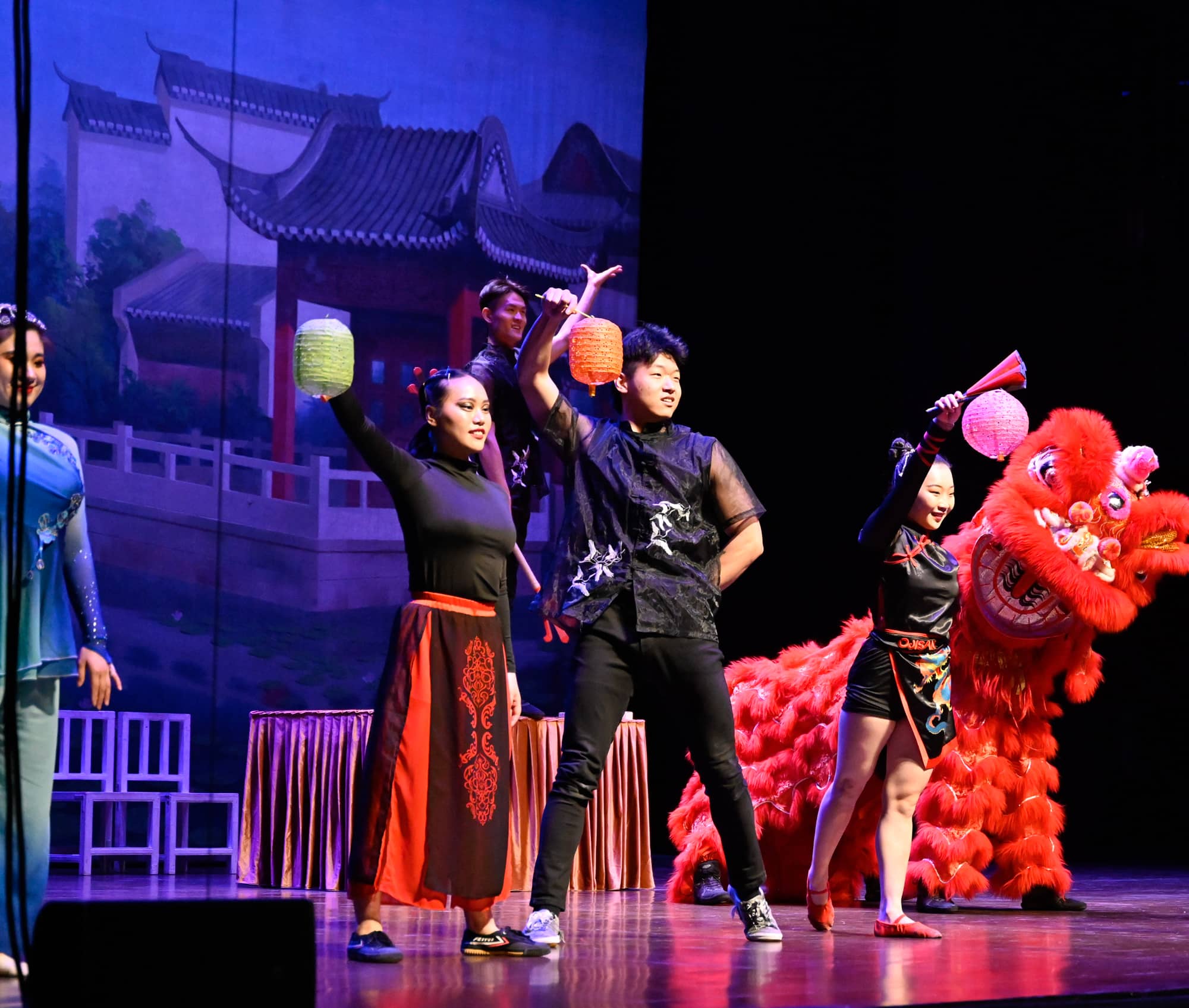 Performance at the Fine Arts Center featuring a traditional Chinese dragon dance