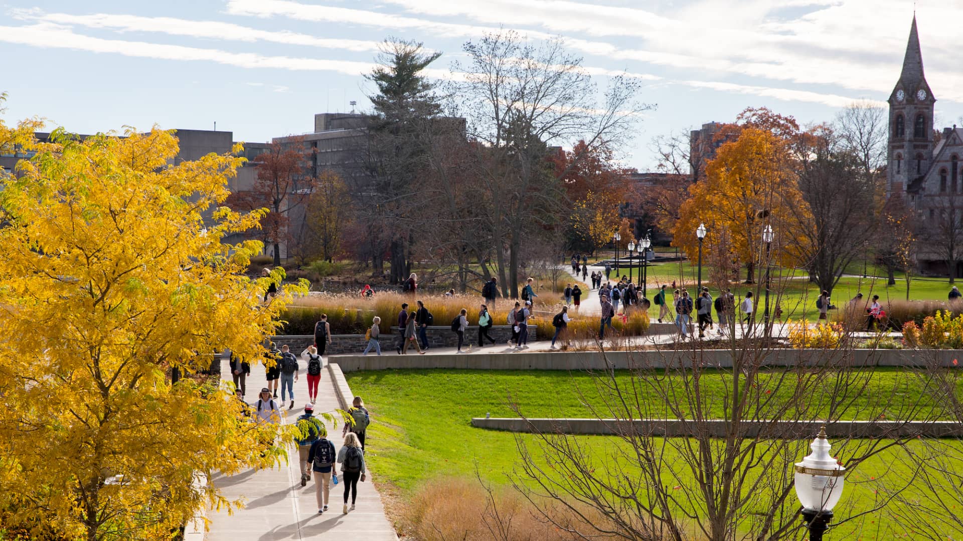 View of students walking on campus with Old Chapel in the background