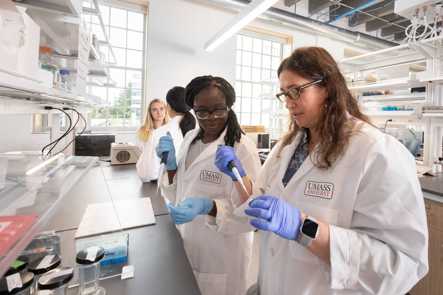 People in a lab at UMass