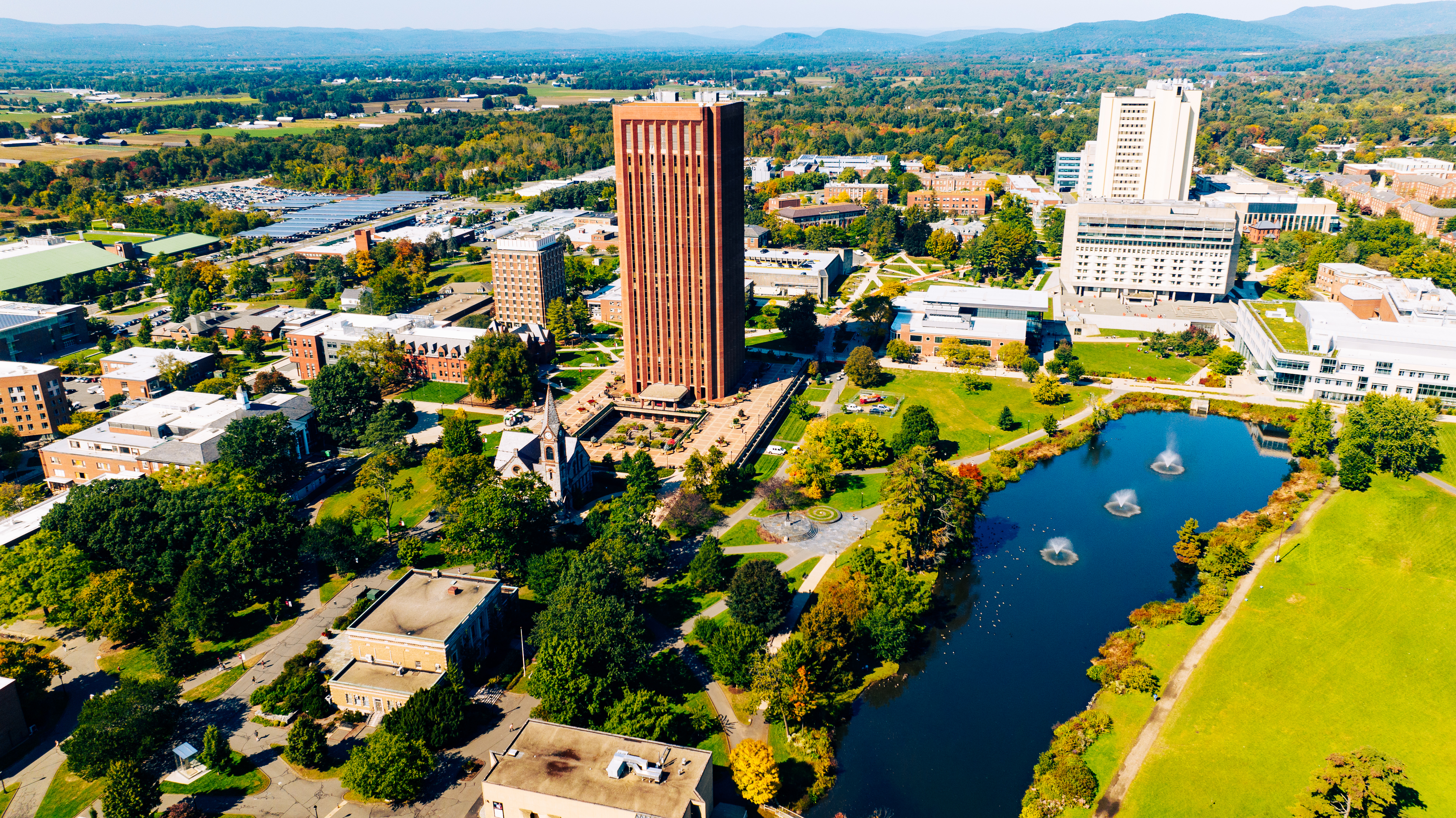 Aerial view of the campus pond and library.