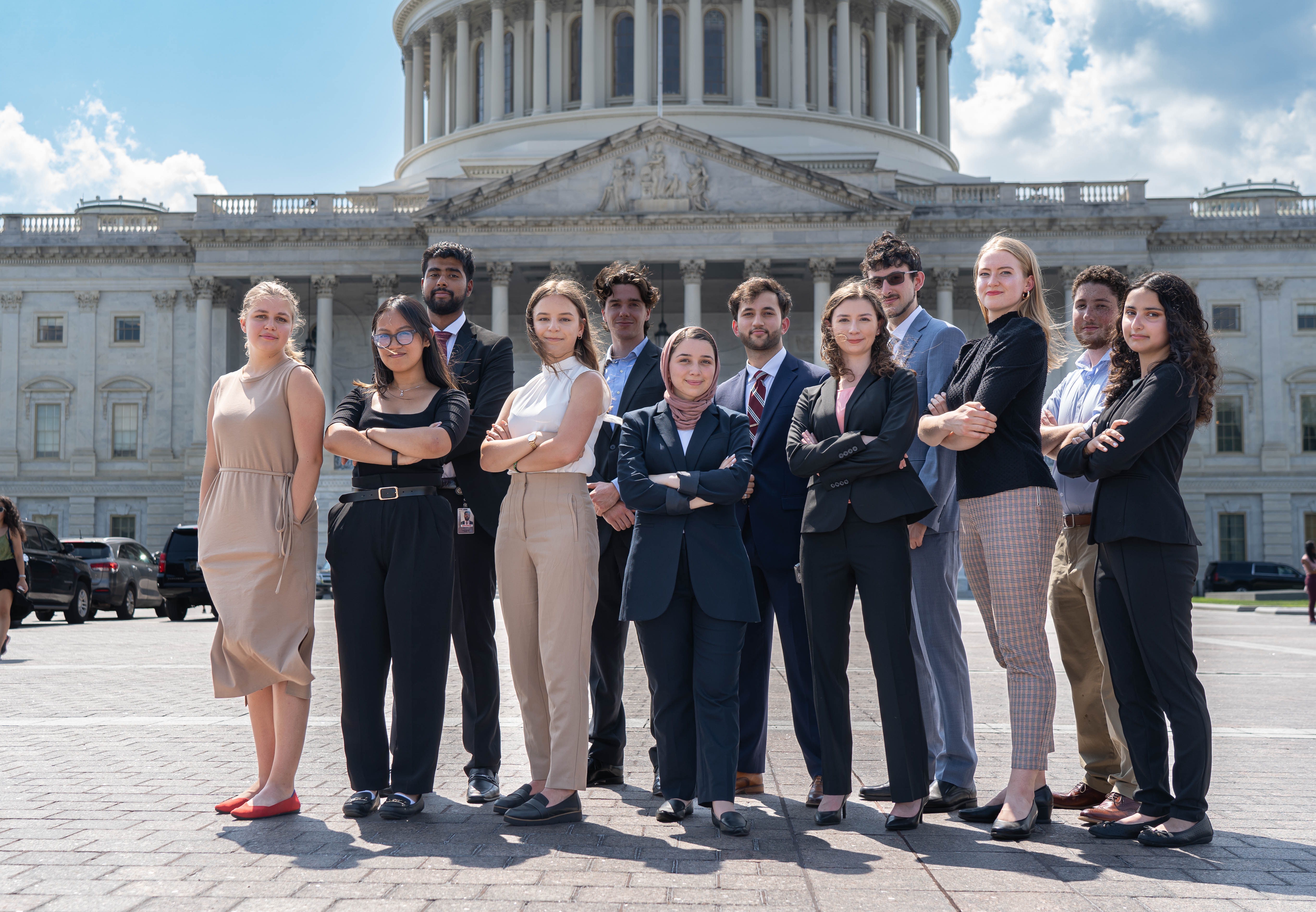 Group of students standing in front of the capitol building