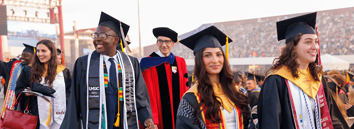 Graduates walking to their seats for commencement