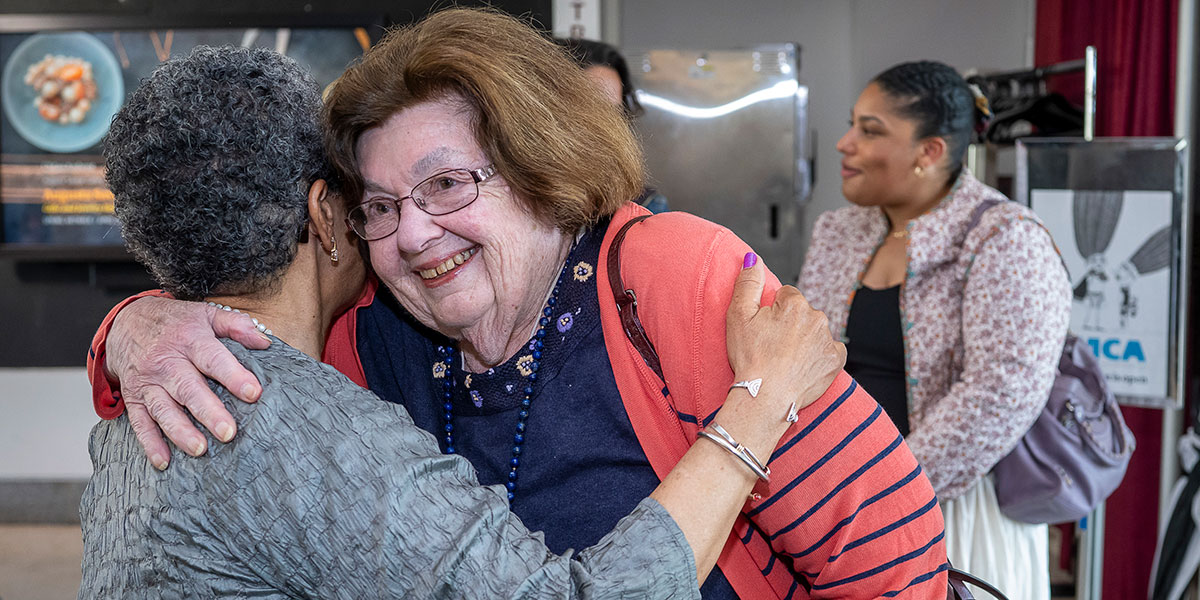 Hilda Greenbaum and Joye Bowman embrace at Bowman’s retirement celebration on May 8, 2025, where the Dr. Joye Bowman Cultural Resources Fund Endowment was first announced.